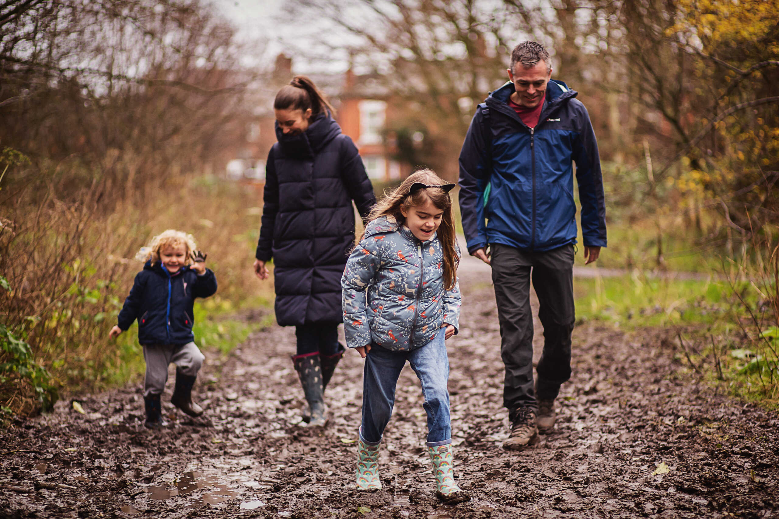Family walking in the woods