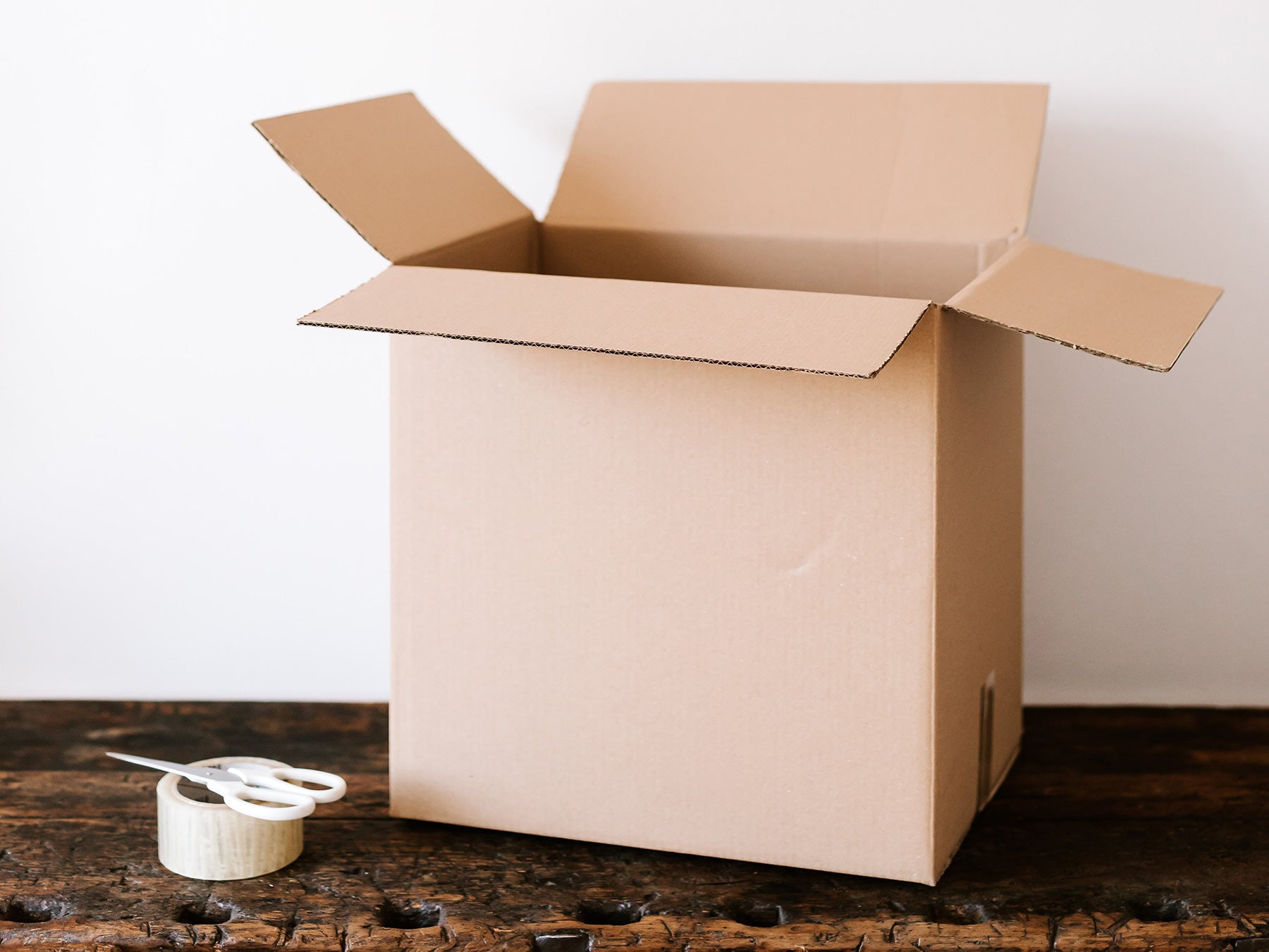 cardboard box on a wooden table 